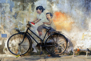 Street art penant, history, malaysia, george town penang, boy and girl on bike